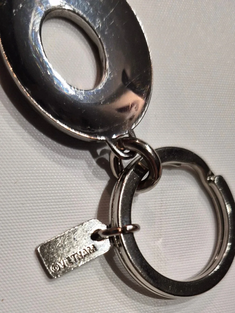 Coach Studded Leather Turnlock Keychain
